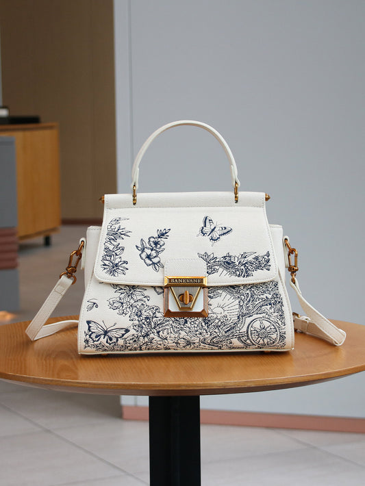 EMBROIDERED CANVAS SADDLE BAG