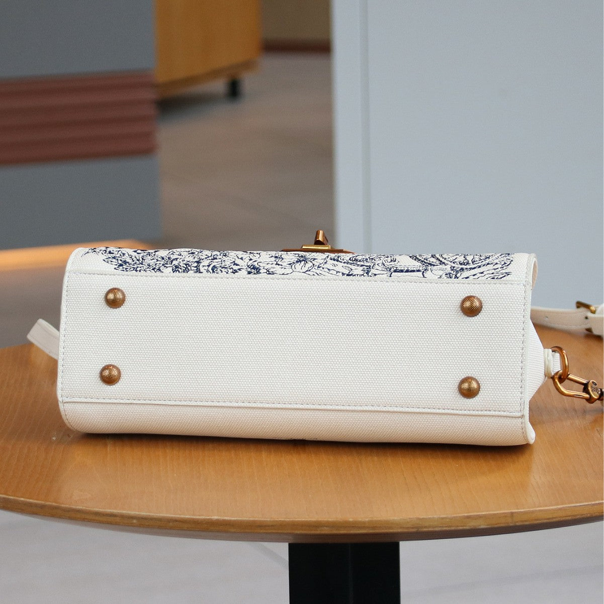 EMBROIDERED CANVAS SADDLE BAG
